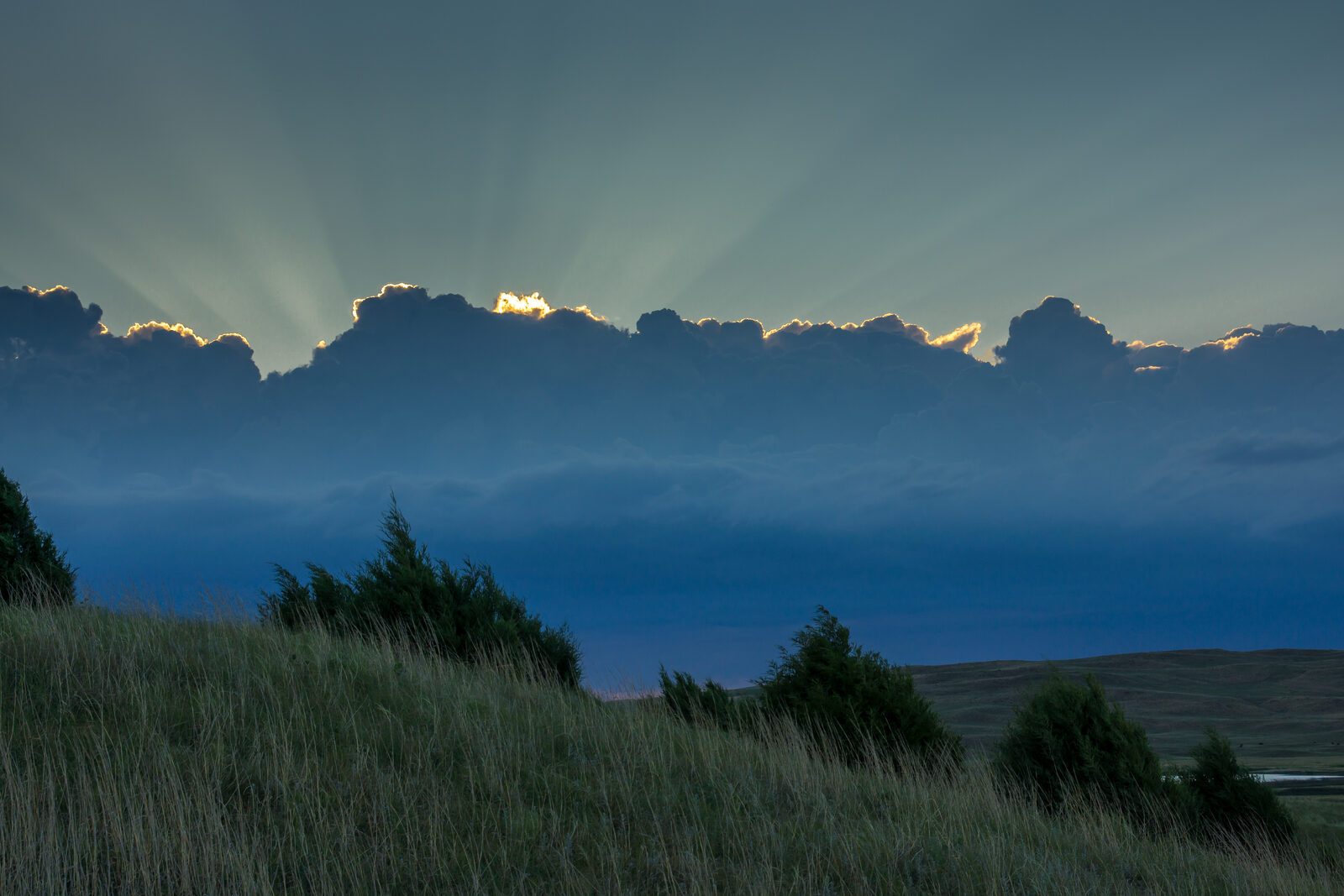 Sunset rays through clouds